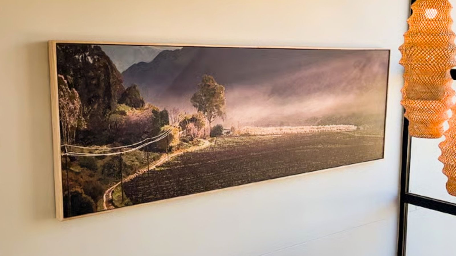The Majestic Homestead scene painted more than three metres wide, hanging in a client's home