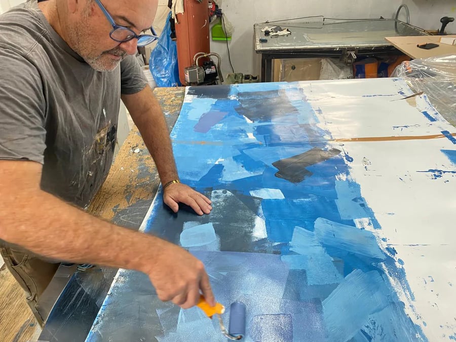 Martin Osner working on a piece of art in his studio
