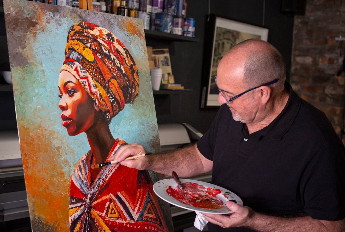 Martin Osner finishing Hlengiwe at the easel in his Hout Bay studio