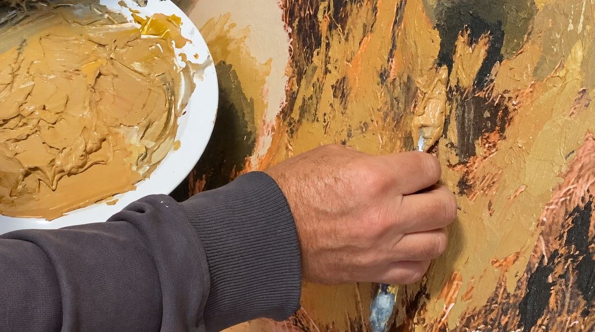 Martin Osner working paint into a print