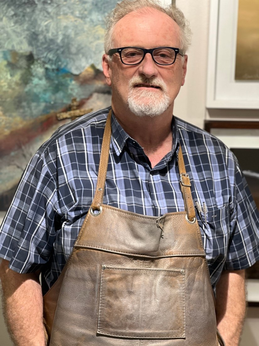 Simon Shone, goldsmith and sculptor, in his workshop